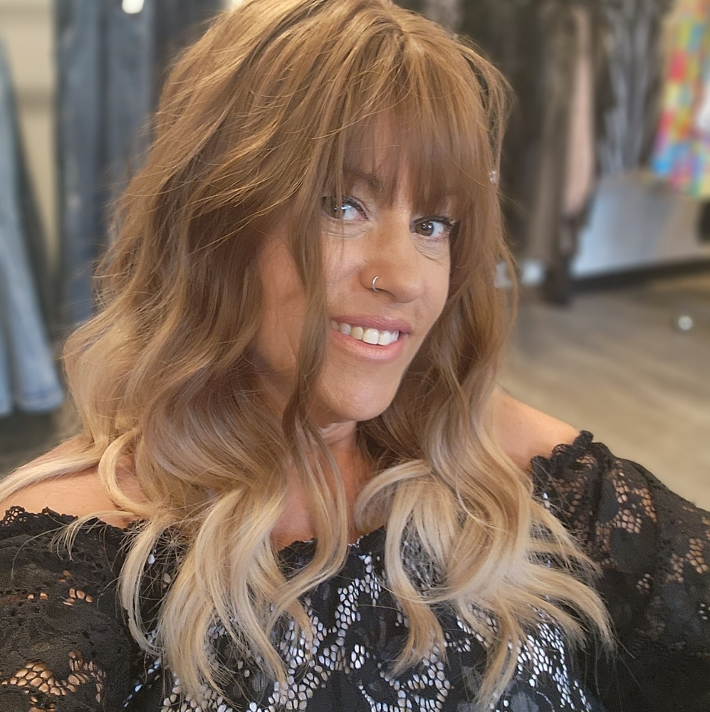 Synthetic, Warm light brown, ombre into blonde wig.  Already cut and styled